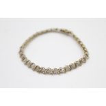 10ct gold diamond set tennis bracelet (6.2g)