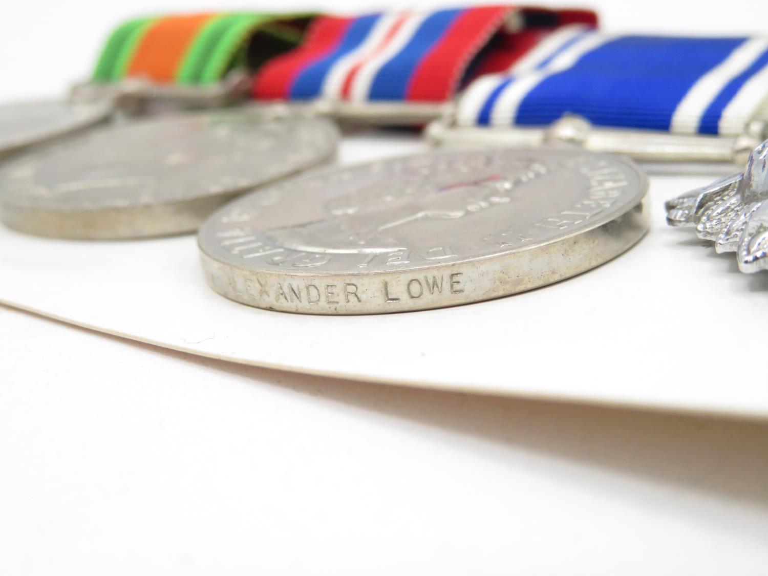 Police medal group to Superintendent A Lowe of Wakefield - mounted with pips and badges - Image 3 of 4