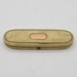 Early 3.5" manicure set in ivory and gold box with mirror back on inside