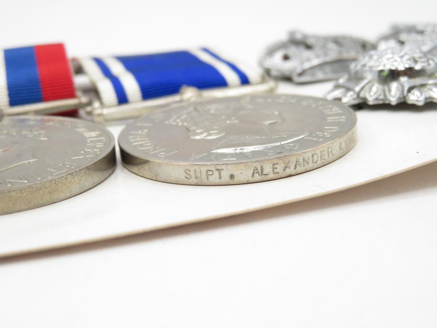 Police medal group to Superintendent A Lowe of Wakefield - mounted with pips and badges - Image 2 of 4