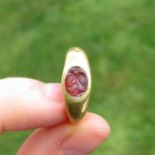Roman gold ring child's size with engraved Intaglio probably garnet 1.7g