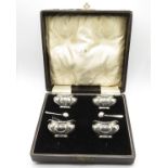 Boxed set of 4x silver salts with liners and 2x silver spoons