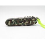 As new Swiss Army knife with camouflage handle