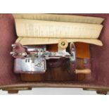 Miniature Singer child's sewing machine boxed