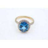 9ct gold blue topaz & diamond halo cocktail ring (3.3g) size O