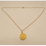 9ct gold chain 1.1g and 18ct gold pendant 2.7g