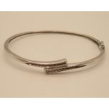 9ct white gold bangle with diamond chippings 6.8g