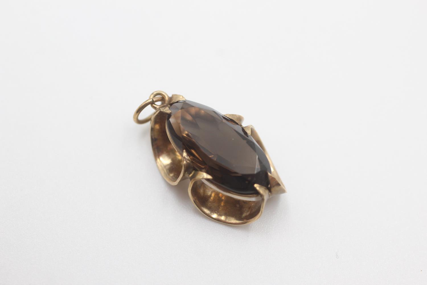 9ct gold smokey quartz stylised pendant (2.9g)