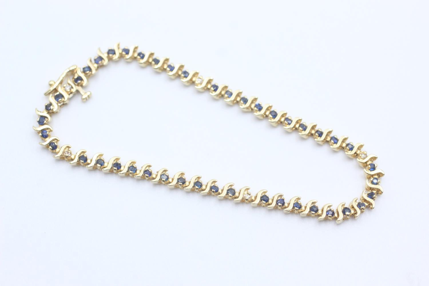 14ct gold vintage saphire & diamond stylised tennis bracelet (7.3g)