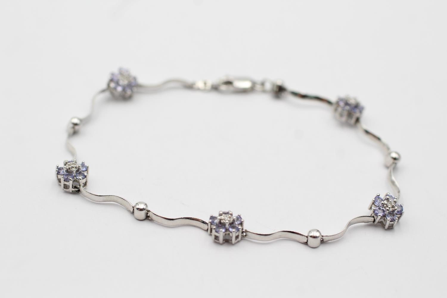 14ct white gold tanzanite & diamond stylised floral bracelet (4.7g) - Image 2 of 4