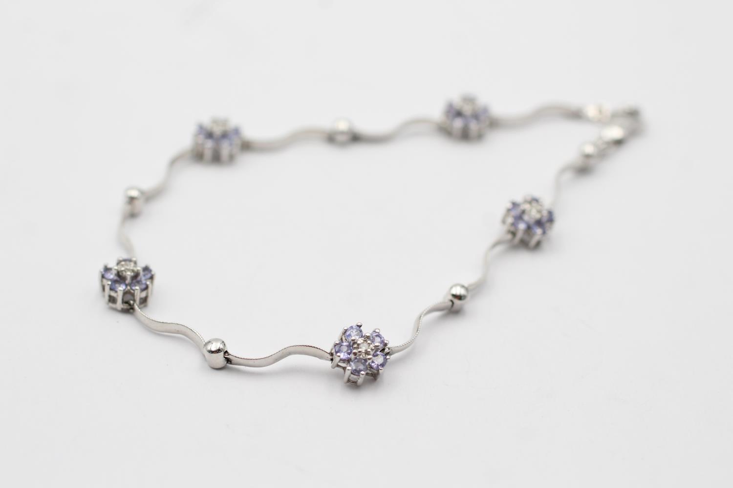 14ct white gold tanzanite & diamond stylised floral bracelet (4.7g)