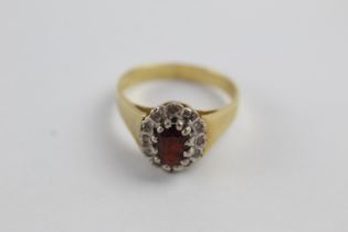 18ct gold garnet & diamond halo ring (4.8g) size N