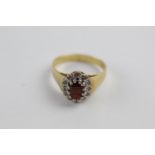 18ct gold garnet & diamond halo ring (4.8g) size N