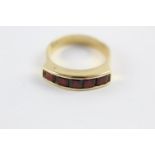 18ct gold garnet channel set ring (5.1g) size R