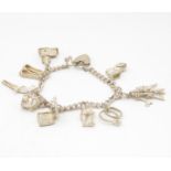 Silver charm bracelet 36.4g