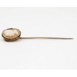 14ct gold cameo topped stick pin with 9cty gold shaft 4.5g