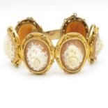 14ct gold bracelet with carved shell cameo inserts each panel measuring 40mm long x 30mm wide