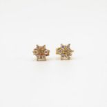 Pair of 18ct gold and diamond earrings .9g