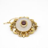 9ct gold framed brooch with white stone and cabochon garnet centre stone 50mm wide 17.2g