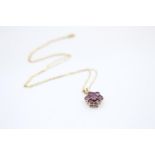 9ct gold ruby floral set pendant on chain (1.5g)