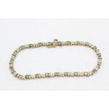 9ct gold emerald & diamond tennis bracelet (6g)