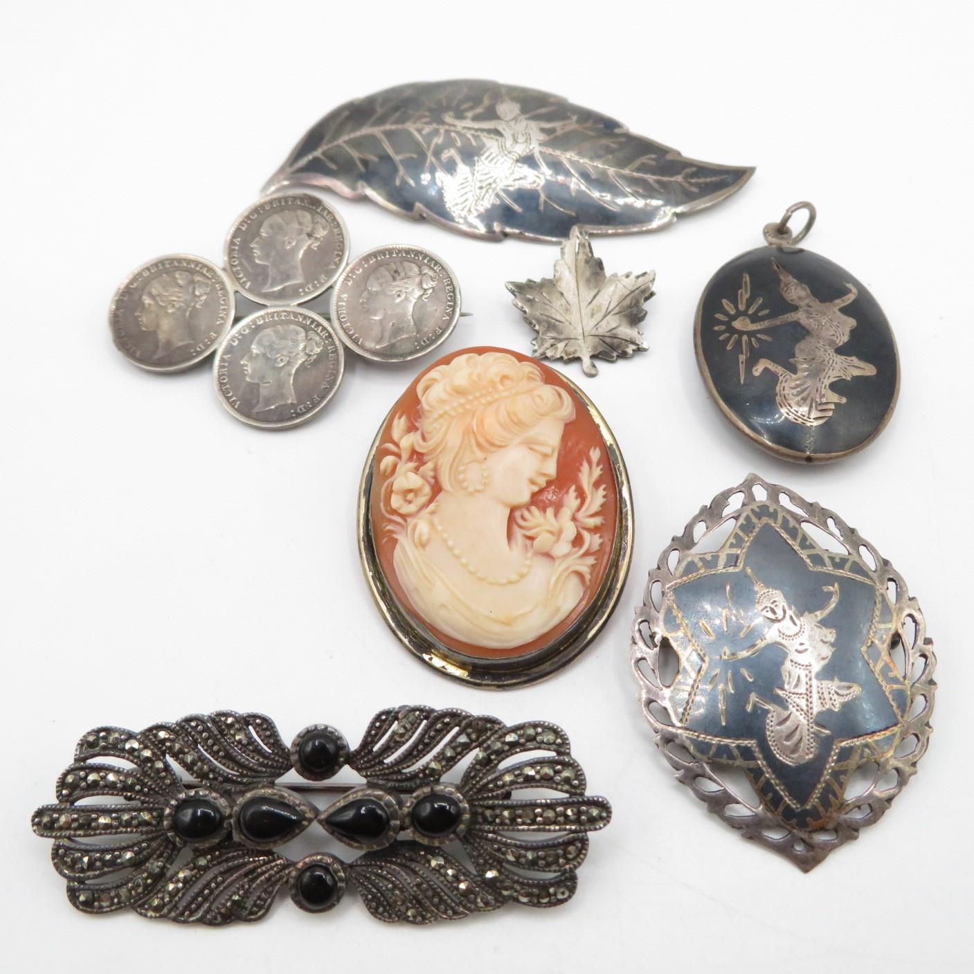 Collection of silver brooches