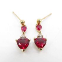Boxed set of 9ct gold drop earrings with red stones in shape of hearts 4.7g