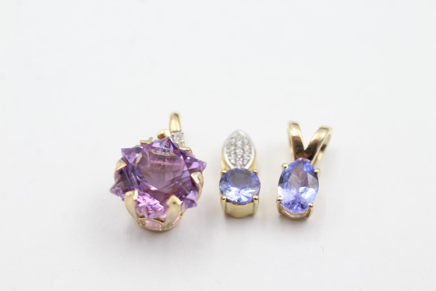 3 x 9ct gold gemstone set pendants inc. tanzanite, amethyst & diamond (3.6g)