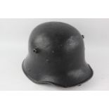 WW1 GERMAN Steel Helmet w/ Shell & Leather Strap In vintage condition Signs of use & age Please s