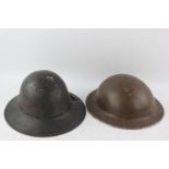 2 x WW2 BRITISH Steel Helmets Inc 1941 Dated Zuckerman In vintage condition Signs of use & age Pl