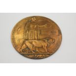 WW1 Death Plaque Named James John Currie (300g) Diameter - 12.5cm In antique condition Signs o