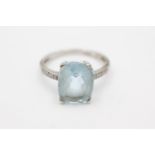 9ct white gold blue topaz & diamond cocktail ring (3.6g) Size S