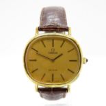 OMEGA De Ville gent's vintage gold plated wristwatch hand wind working oval case and gilt dial