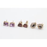 3 x 9ct gold paired gemstone stud earrings inc. amethyst, sapphire & garnet (2.8g)
