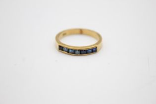 18ct gold sapphire channel set ring (3.8g) Size Q