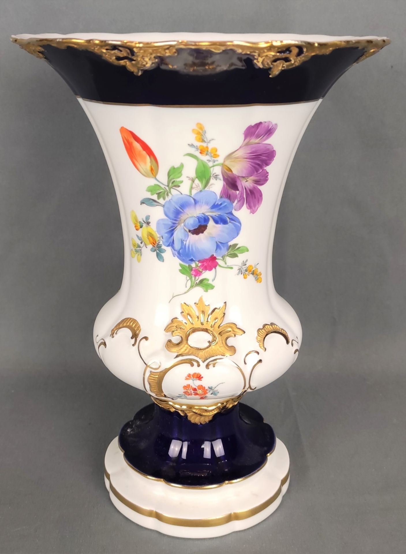 Decorative vase, elaborately polychrome painted with floral motifs, cobalt blue background and rich