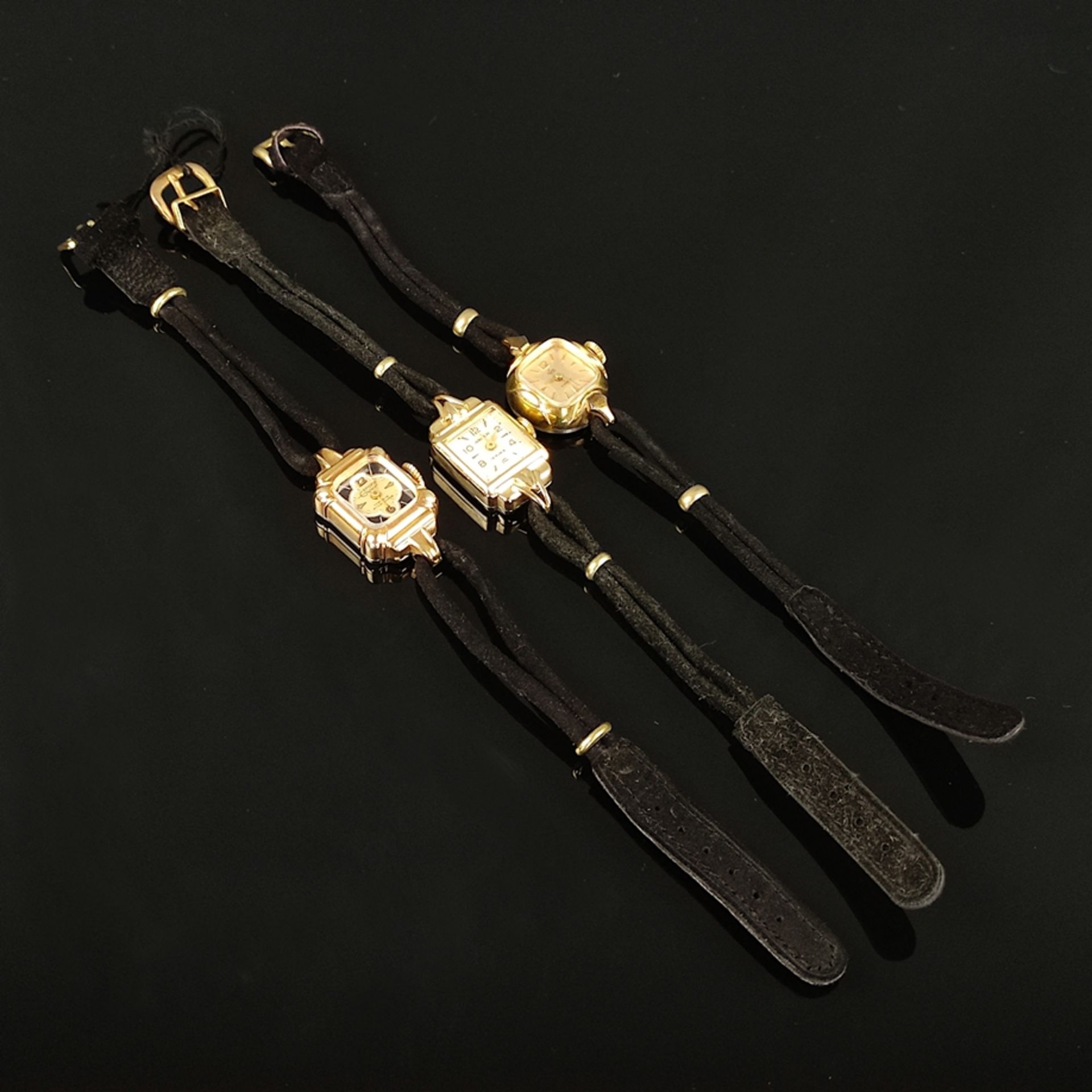 3 Damenarmbanduhren, Anker, Epora und Kfm, vergoldete Gehäuse, teilweise mit arabischen Ziffern und