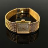 Armbanduhr, Page, 585/14K Gelbgold, Gesamtgewicht 26,5g, rechteckiges Ziffernblatt mit Indizes, Maß