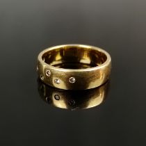 Band ring, 585/14K yellow gold, 6,8g, set with 7 zirconia, ring size 56