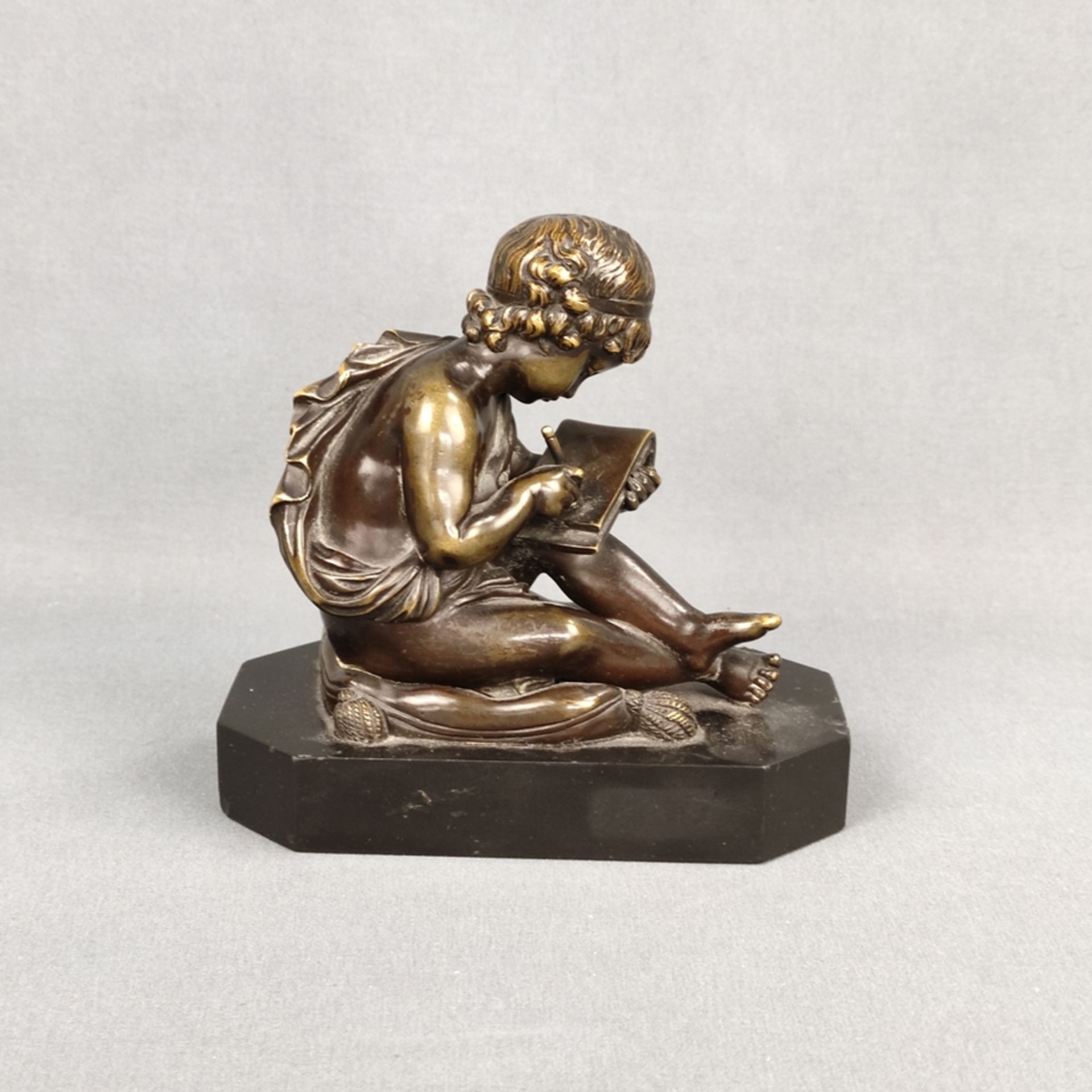 Writing boy sitting on cushion, after Charles Gabriel Lemire (1741 Lunéville - 1827 Paris), bronze 