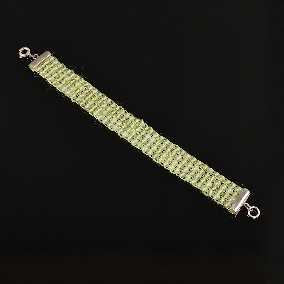 Jade bracelet, 4 rows, silver 925, total weight 18,4g, braided bracelet of light green translucent 