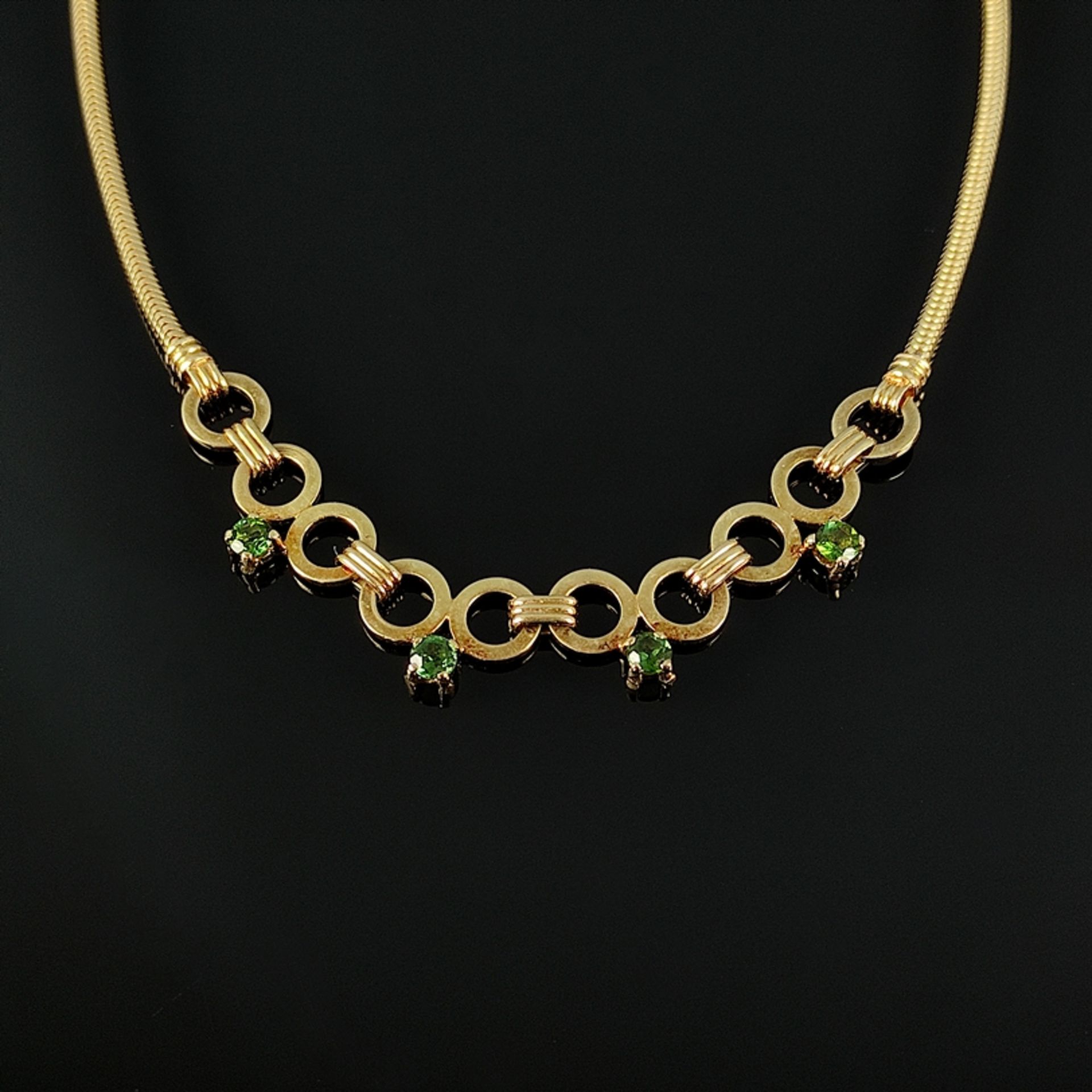 Fancy necklace with green tourmalines, 585/14K yellow gold, 24,9g, middle part worked of round elem