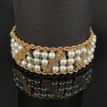 Perlen-Gold-Armband, 585/14K Gelbgold, Gesamtgewicht 51,1g, besetzt mit 71 Perlen, Kordelränder und