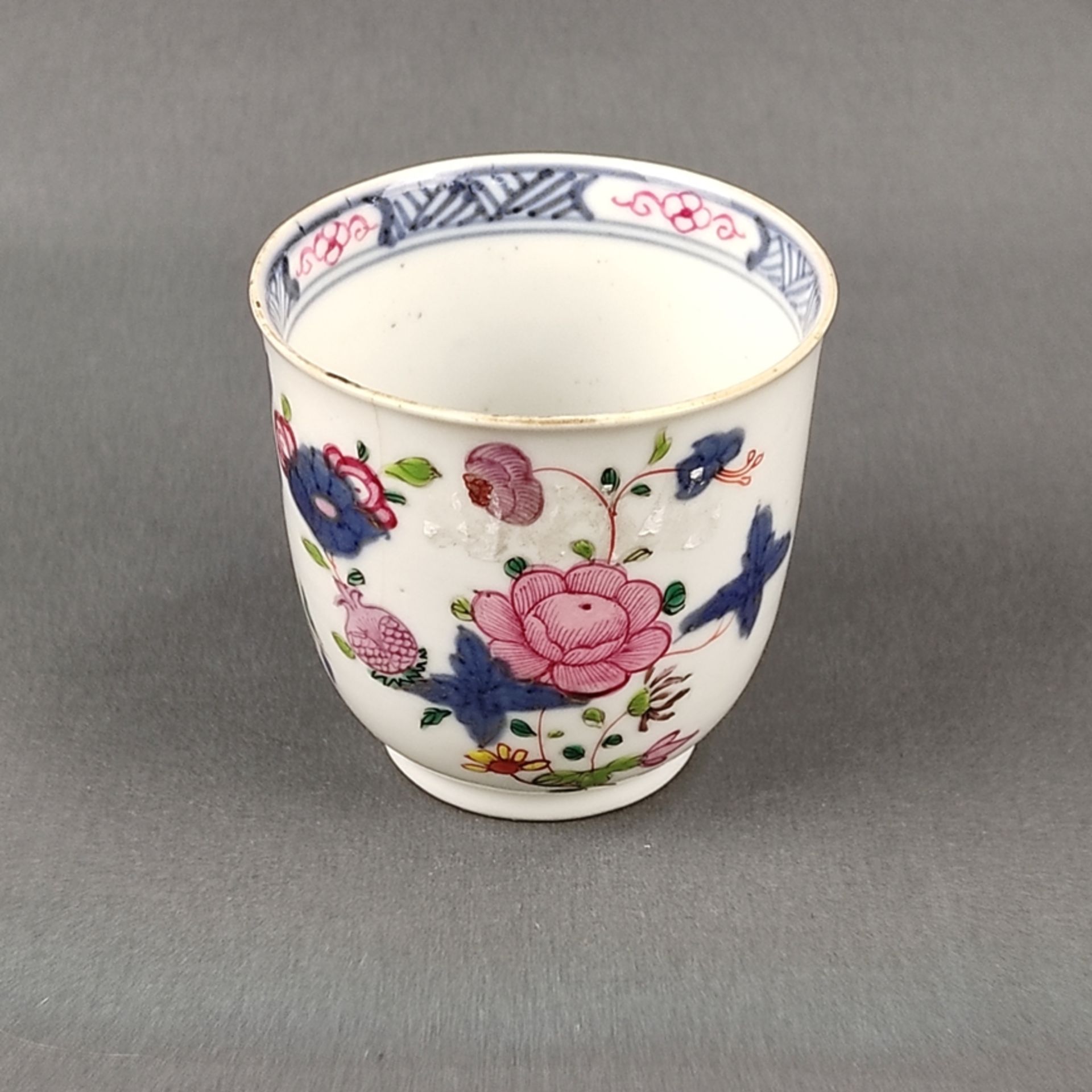 Cup, famille rose, China circa 1900, porcelain cup with polychrome floral decoration, gilding resid