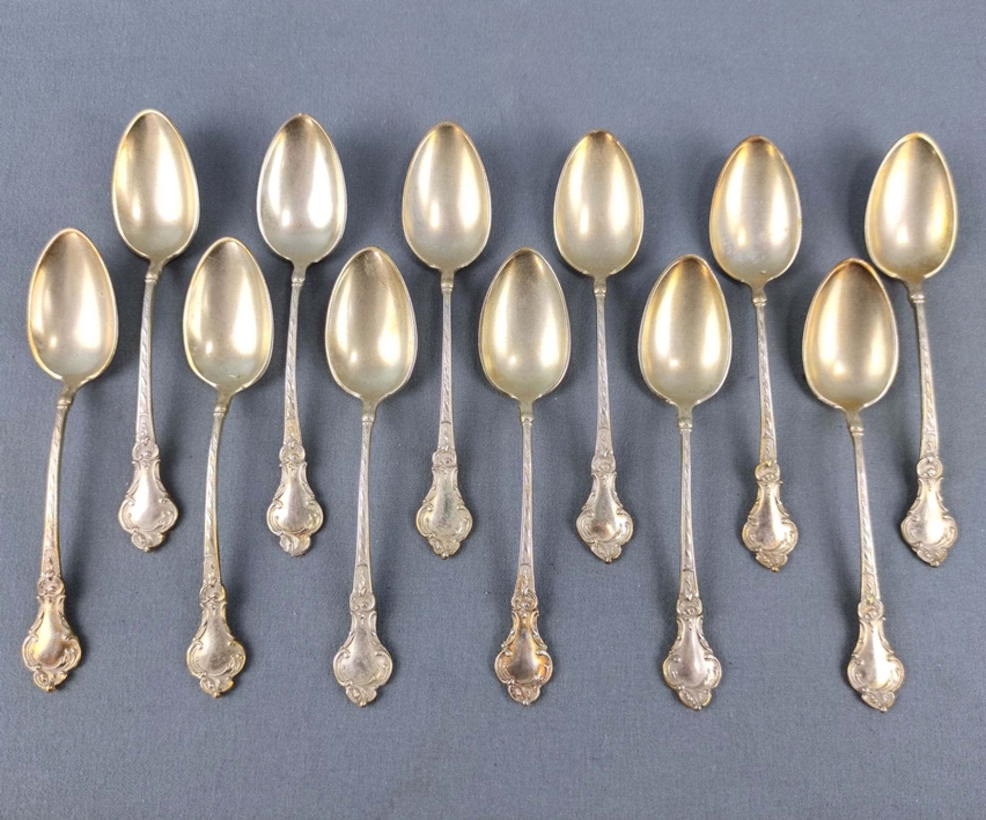 12 demitasse spoons, rocaille decoration in relief, Germany, silver 800, in case "Brinckmann & Lang - Image 2 of 3