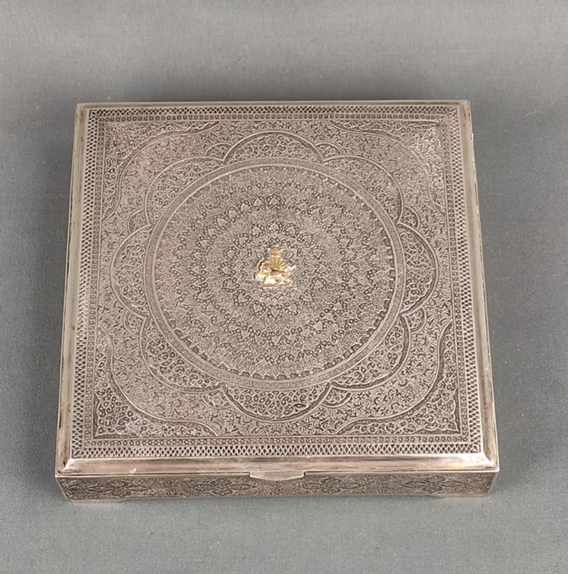 Iranian rectangular lidded box, elaborate chased fine decoration on all sides, centered on lid Iran