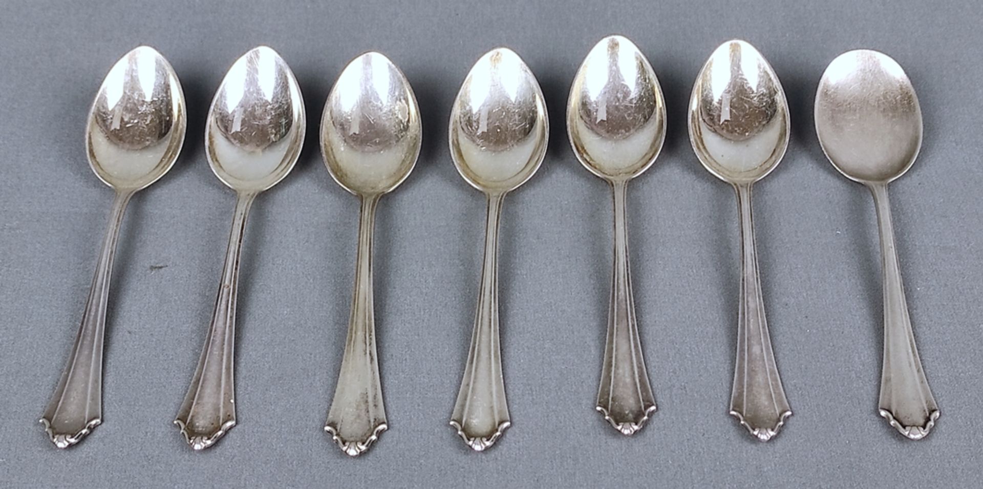 6 coffee spoons and one sugar spoon, silver 800, with finials fanned out to the back, Bremer Silber