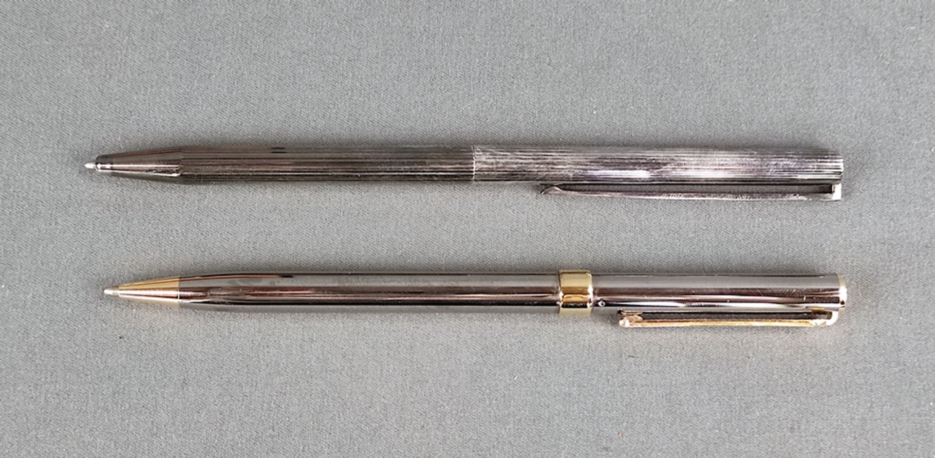Two writing utensils, Tiffany & Co. and S.T. Dupont, consisting of a twist ballpoint pen, bicolour, - Image 2 of 4