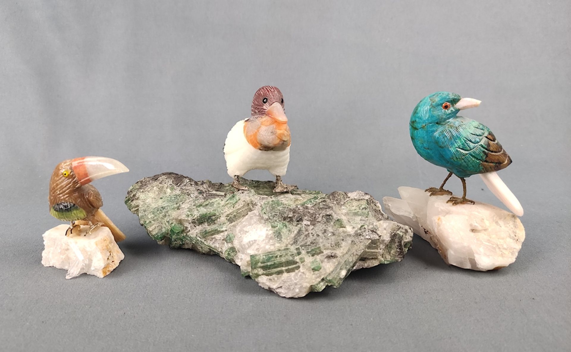 3 birds made of semi-precious stones, consisting of "toucan" sitting on rock crystal, height 6.5cm,