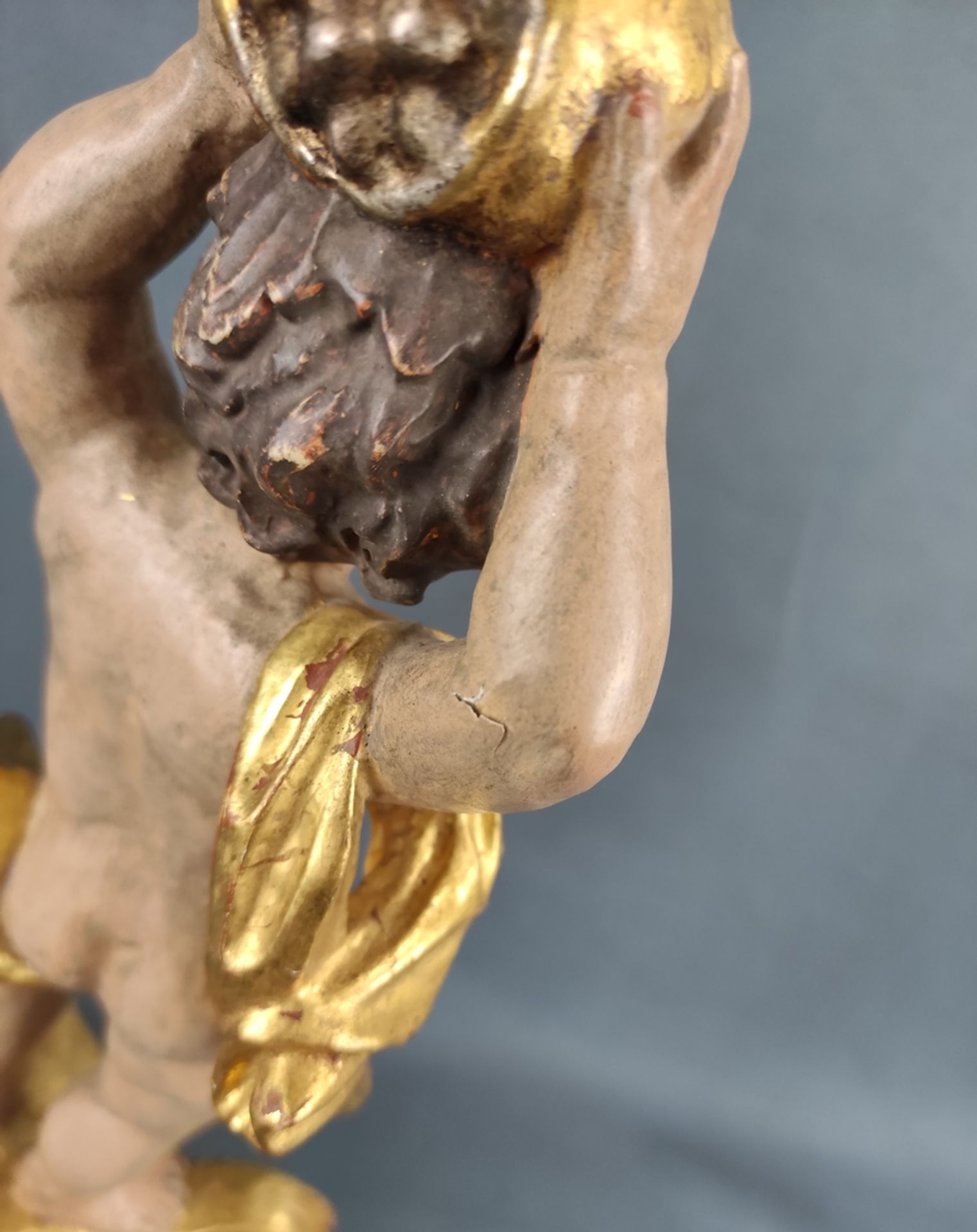 Large wooden candlestick in baroque style, carved, three-legged base with putto carrying profiled a - Image 4 of 5